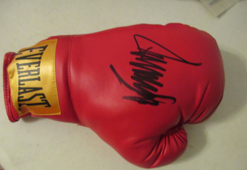 Illustration for article titled Trump's Autographed Bibles, Guitars, and Boxing Gloves Are on eBay If That's Your Kind of Thing